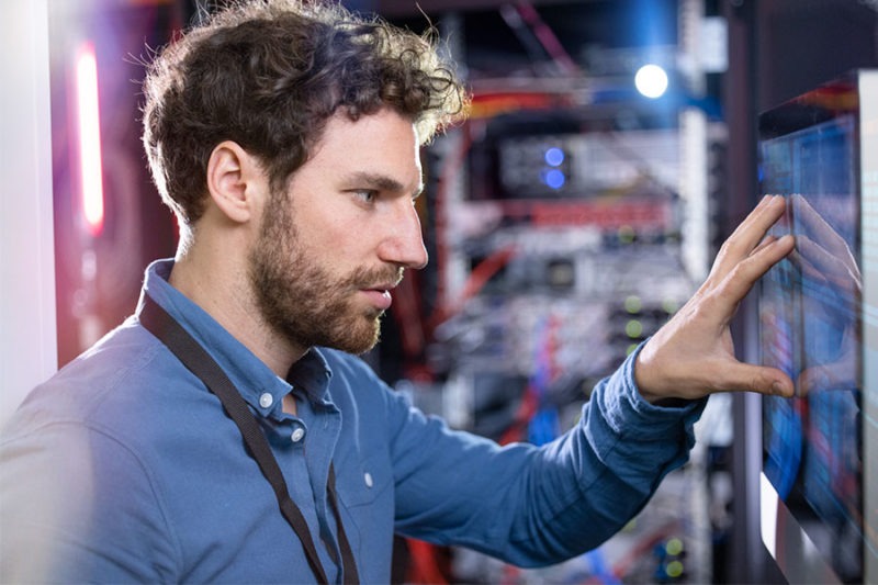 IT technician looking at the WiFi network design.